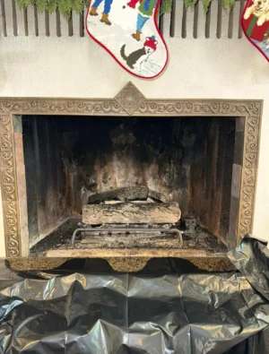 Dirty fireplace before chimney cleaning by Air i Am Duct & Chimney Services Houston