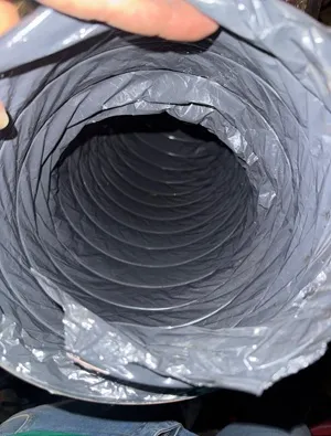 Flexible dryer vent cleaned and restored for improved airflow